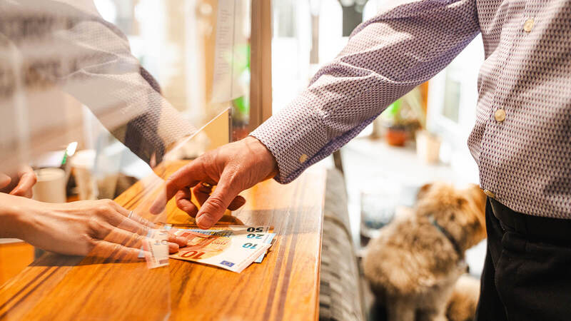man exchanging money